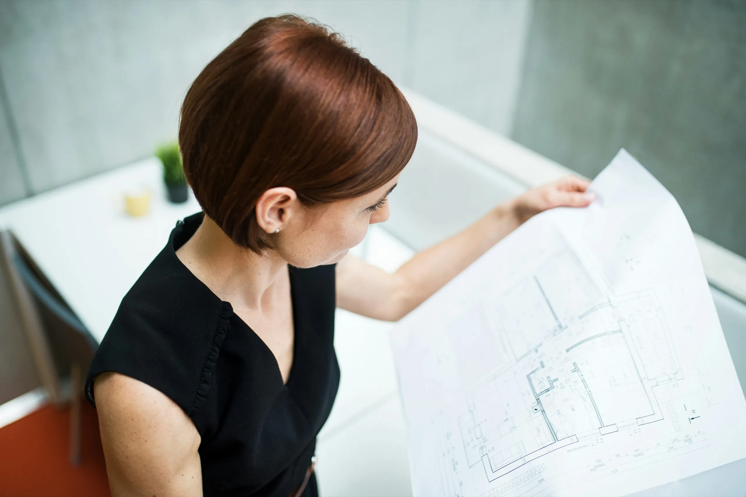 Architect reviewing a building floor plan