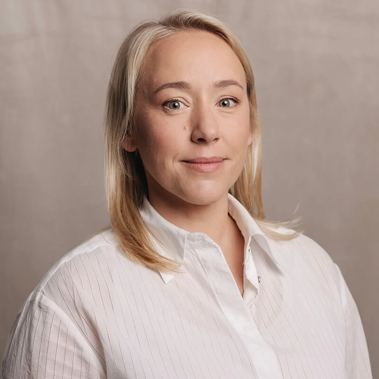 Portrait photo of Danielle West, Director of Corporate Marketing