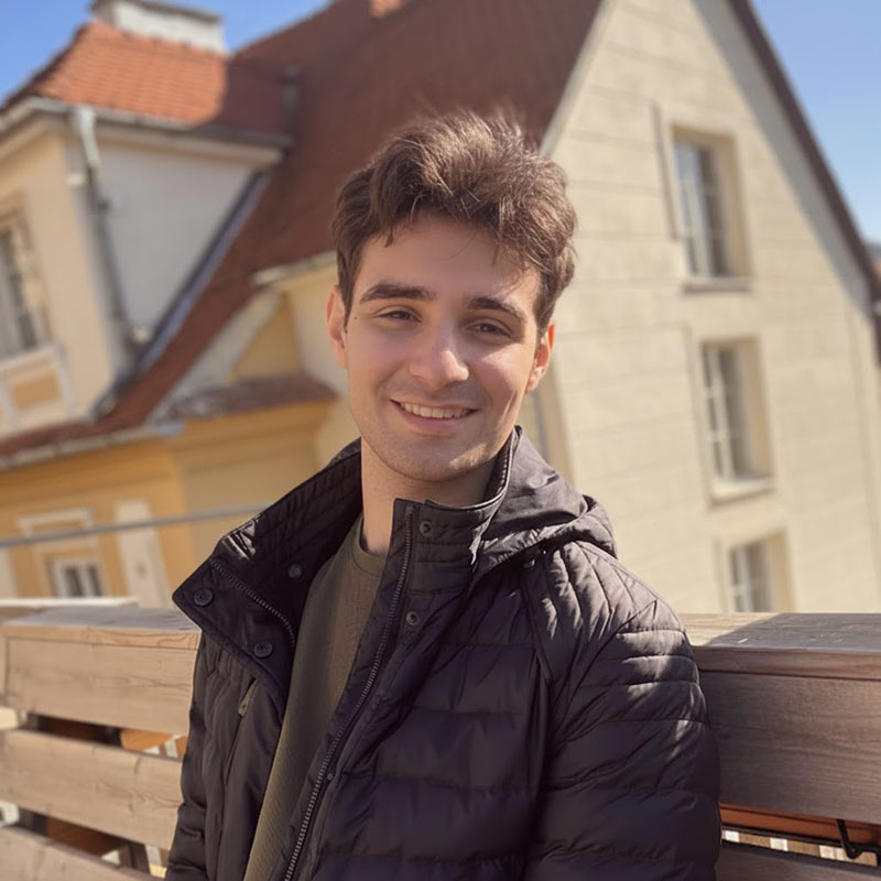 Portrait photo of Denis Moldovan, AI Engineer