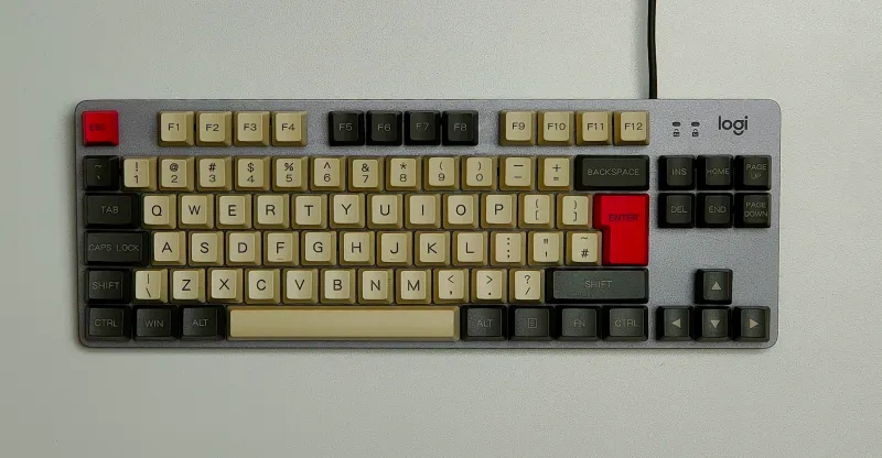 Red, cream, and black keycaps