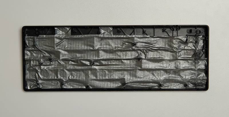 A layer of duct tape on the coins