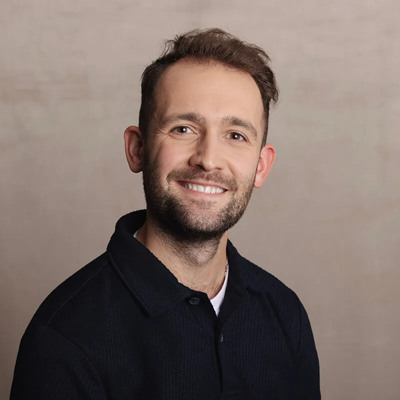 Portrait photo of Ollie Cook, Customer Success Representative