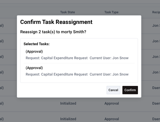 Reassignment confirmation dialog showing progress feedback and status of task reassignment operation